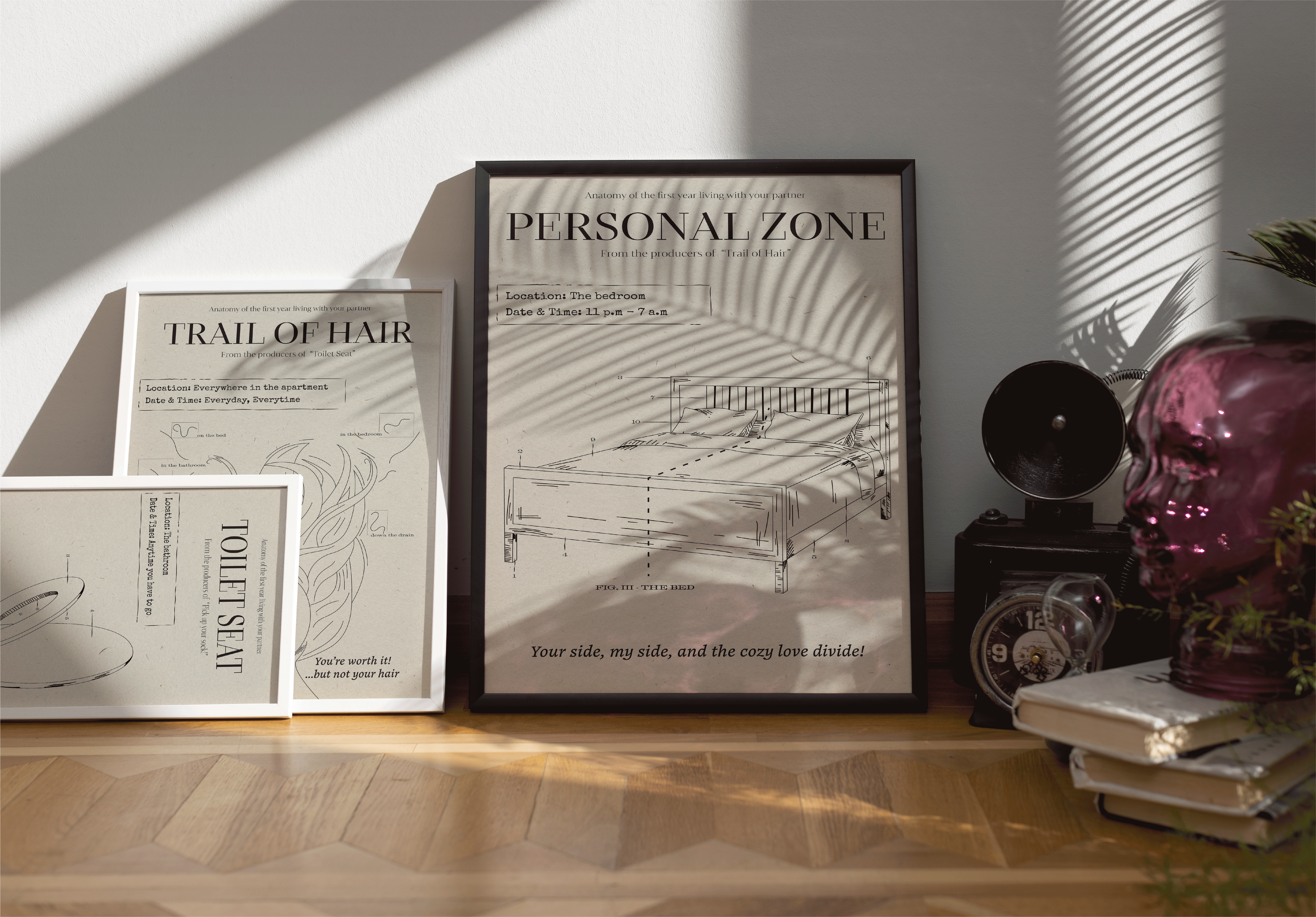 Mockups of the designs of posters depicting the anatomy of the first year living with your partner, framed